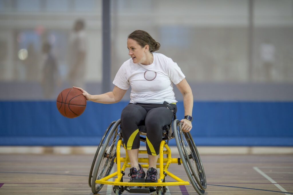 Woman in a Wheelchair Playing Basketball